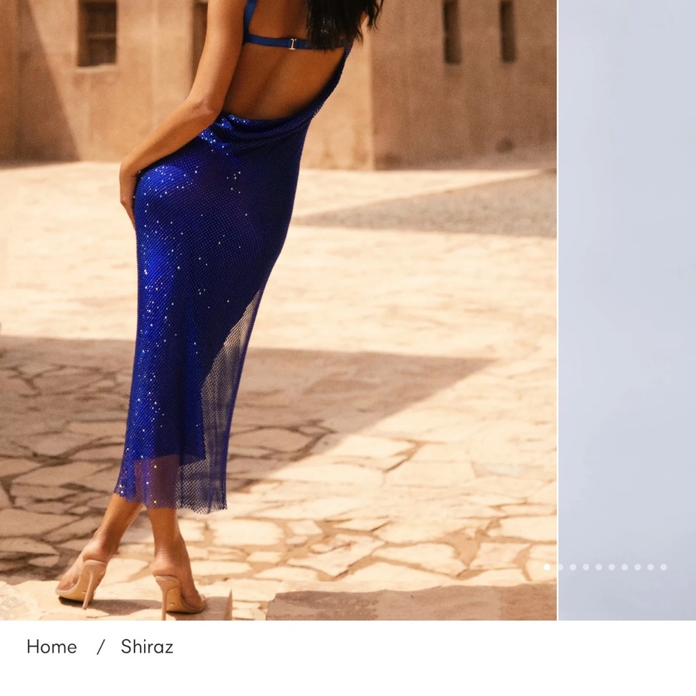 This beautiful blue rhinestone Dress is a perfect special occasion dress.